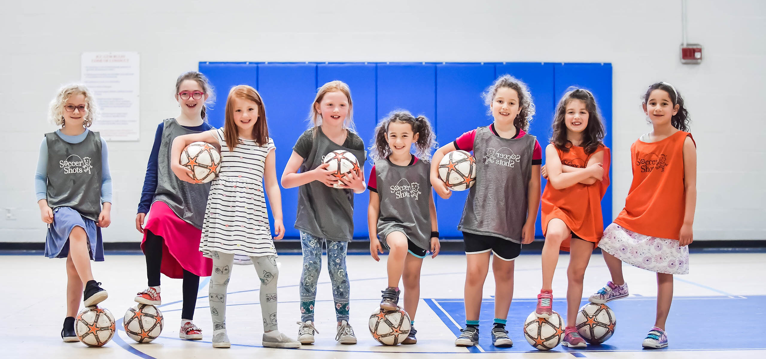 A group of kids ready to play.