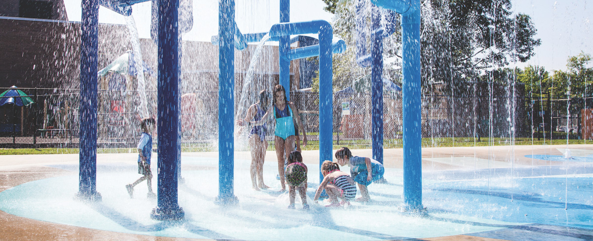 Kids playing at the splashpad.