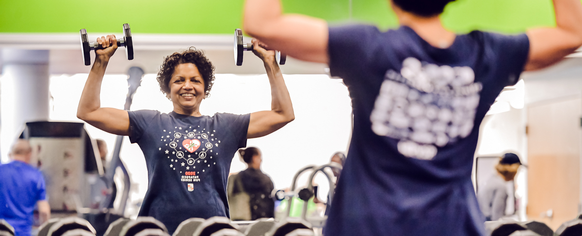 A woman working out in a fitness center.